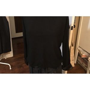 Black sweater with leather like sleeves and collar  perfect condition